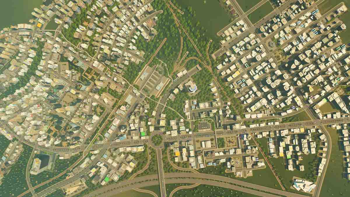 Cities: Skylines 的高空俯视图,展示了包含道路、住宅和商业建筑的密集城市布局